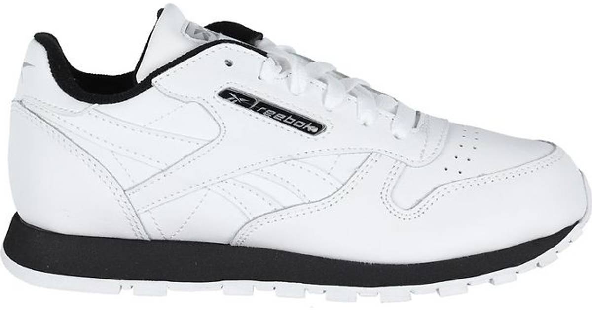 white and silver reebok