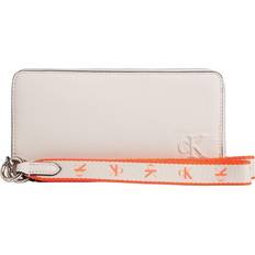 Calvin Klein Jeans Women's Ultralight Zip Around W/Wristlet In Eggshell