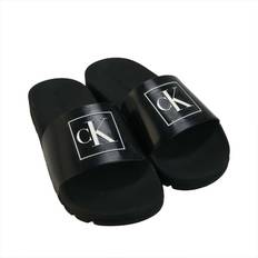 Calvin Klein Women Slippers & Sandals Calvin Klein Womenss Monogram Sliders in Black