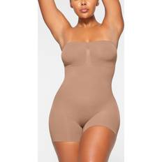 Women Bodysuits SKIMS Womens Sienna Sculpt Strapless Ruched Stretch-woven Body