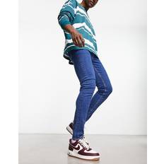 ASOS DESIGN skinny jeans in mid blueW38 L30