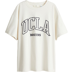 H&M Oversized printed T-shirt - Cream/Ucla