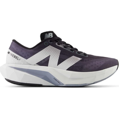 New Balance 37 ⅓ - Women Running Shoes New Balance FuelCell Rebel v4 W - Graphite/Black/Quartz Grey