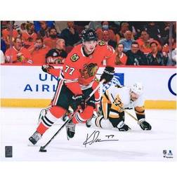 Kirby Dach Chicago Blackhawks Autographed x Red Jersey with Puck Photograph